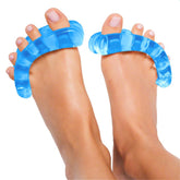 YogaToes Classic sapphire blue toe-stretcher detail showing toe alignment benefits