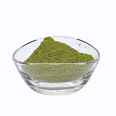 Close-up of Indigo powder texture showing a fine natural pigment for dark hair.
