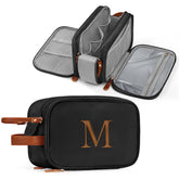 YOOLIFE Initial Black Toiletry Bag open showing large main compartment for travel essentials