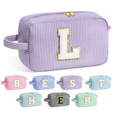 YOOLIFE makeup bag with purple initial monogram, front view showing personalized detail for travel.