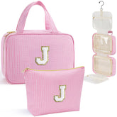 YOOLIFE travel toiletry bag pink hanging with 360° hook for easy access during travel.