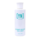 Young Nails Extreme Low Odor Liquid Monomer bottle closeup for low-odor acrylic nail enhancements.