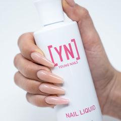 Young Nails Liquid Nail Monomer application closeup highlights creamy self-leveling consistency