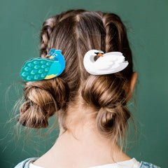 Yussti Birds hair clips with swan motif offer lightweight hold for all hair types.
