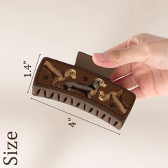 Yussti Dachshund Clips Leather Detail showcases premium material and motif
