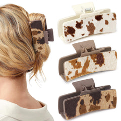 Yussti Western hair clips closeup shows cow leather texture for chic everyday use