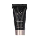 Yves Saint Laurent Black Opium shimmering moisture fluid bottle with subtle iridescent glow on skin