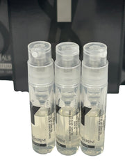 Yves Saint Laurent Y Men vial close-up showing partial fill for fragrance exploration.