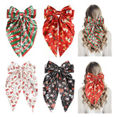 YWAOAIJD Christmas satin bow snowman clip adds festive charm to party hairstyles.