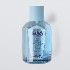 Zara Bluey Ludo Studio EDT bottle tilted to show sandalwood warmth for everyday adventures.
