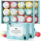 ZenBombs rose-petal bath bomb ready to fizz for a relaxing soak.