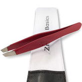 Zizzili Basics ruby red tweezers with surgical-grade stainless steel for precise brow shaping.