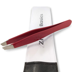 Zizzili Basics ruby red tweezers with surgical-grade stainless steel for precise brow shaping.