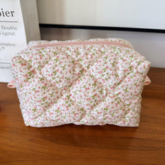 ZUNUONUO cotton quilted makeup bag with little roses pattern, keeps cosmetics organized during travel.