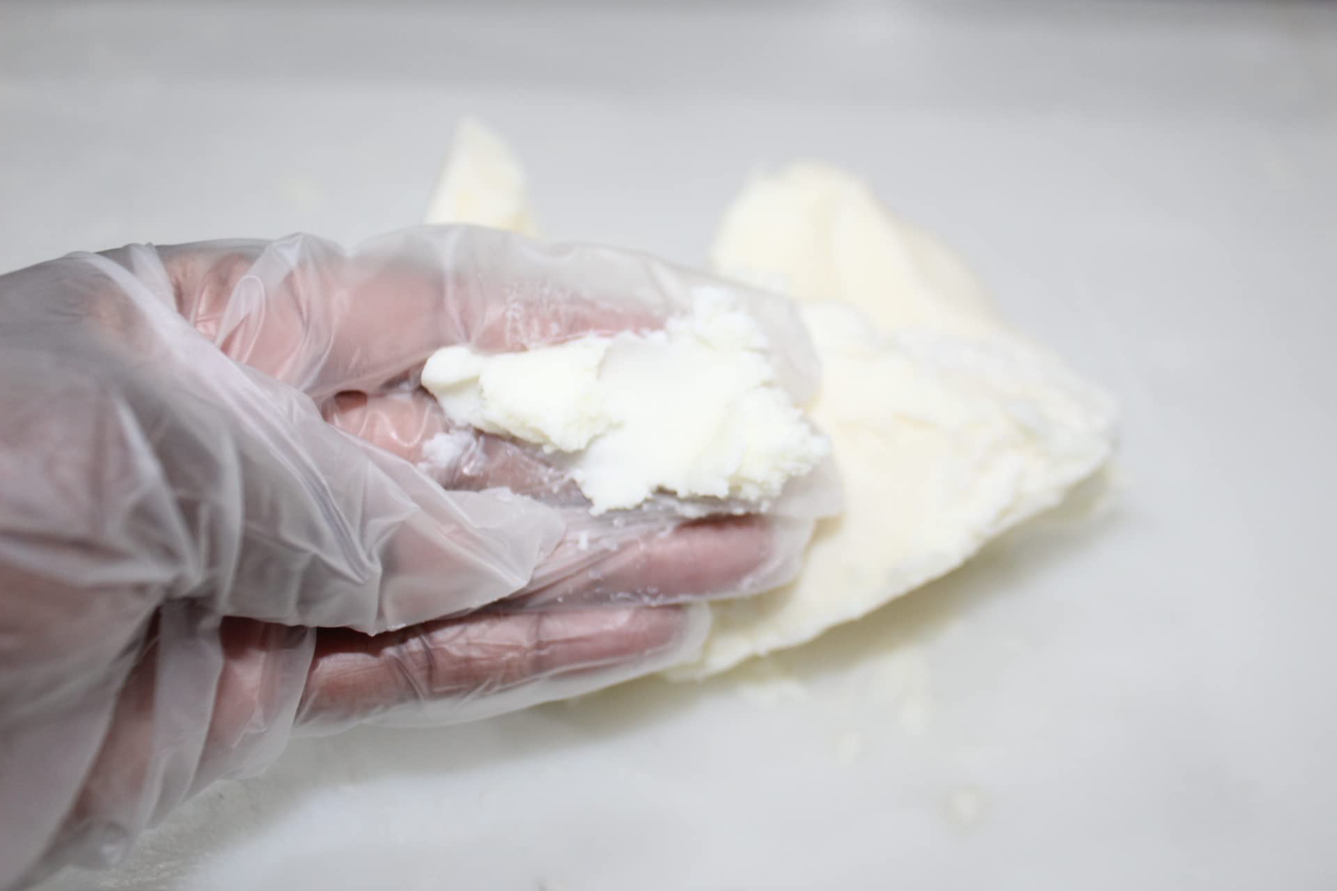 3CAYG shea butter being used for hair care and shine.