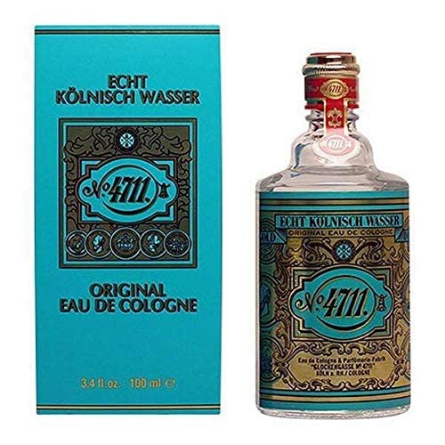 4711 For Men Eau de Cologne Splash pour shot illustrates easy application for a quick mood lift.