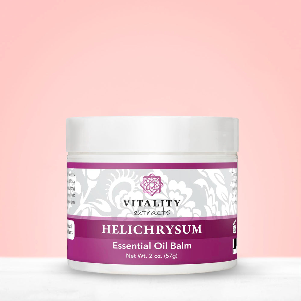 Vitality Helichrysum Balm being applied to hands for soothing moisture
