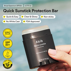 Abib Quick Sunstick glowing finish application close-up for seamless coverage.