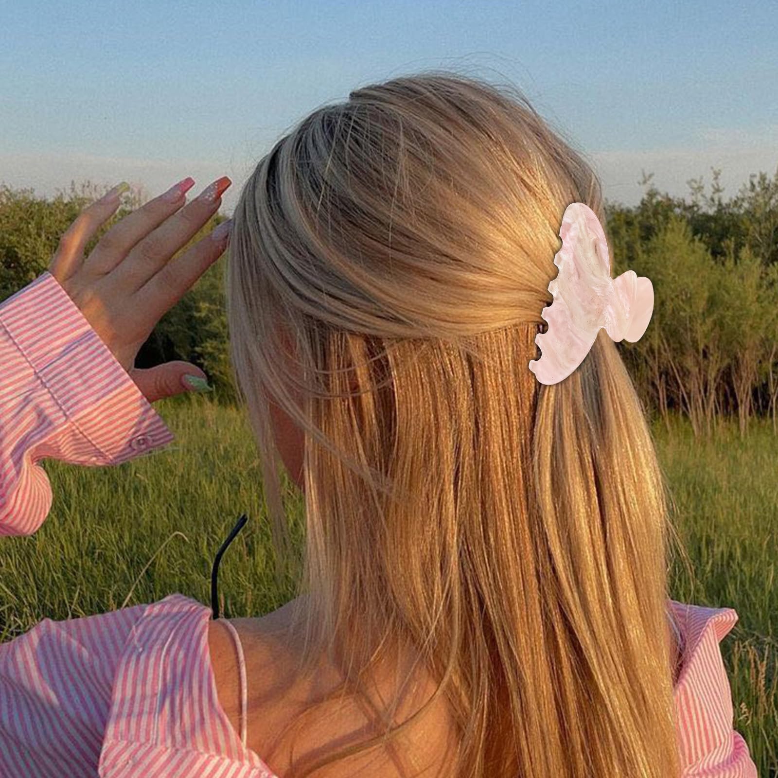ACO-UINT hair clip holds hair in chic updos for errands.