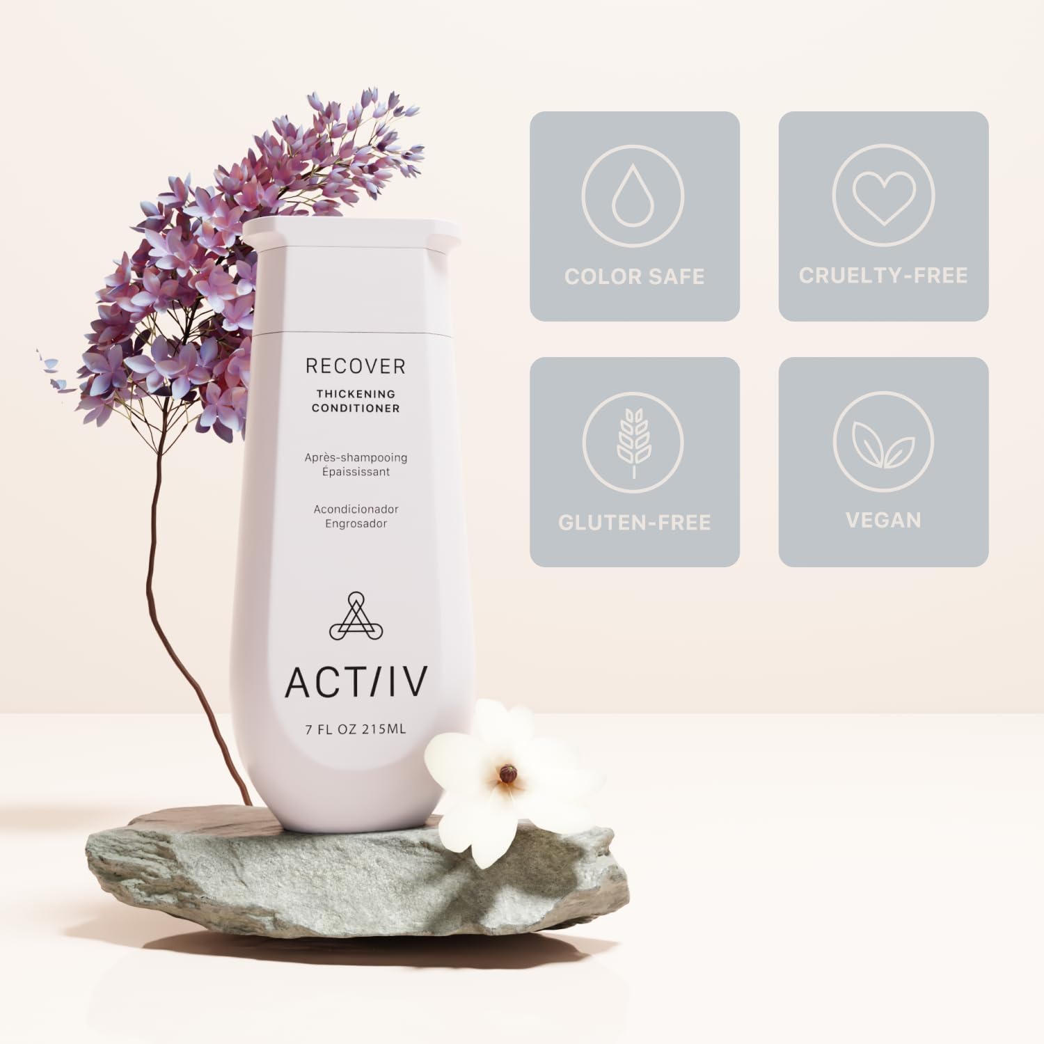 ACTIIV Recover Thickening Conditioner applying to mid-lengths for even coverage