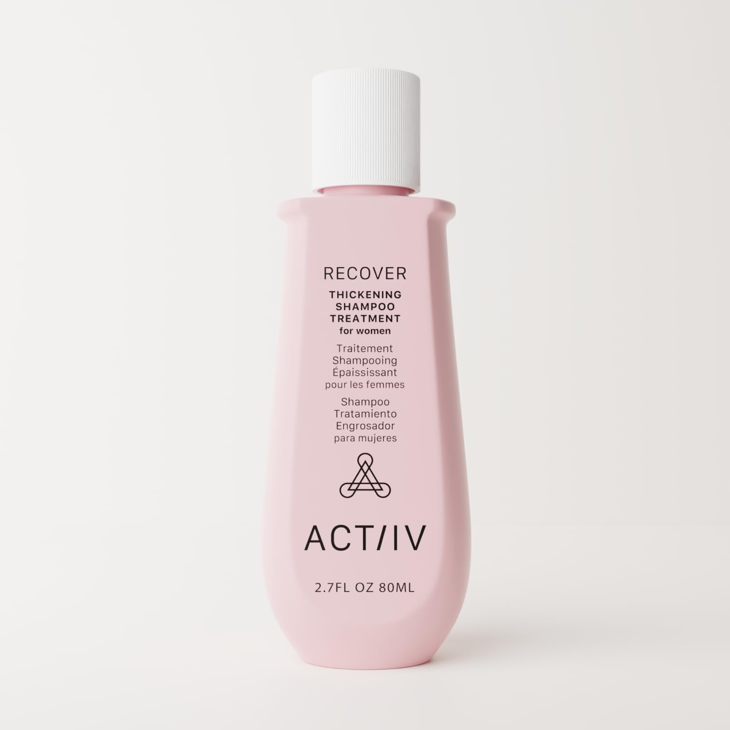 ACTIIV Recover thickening shampoo pour action demonstrates quick cleansing without weighing hair down.