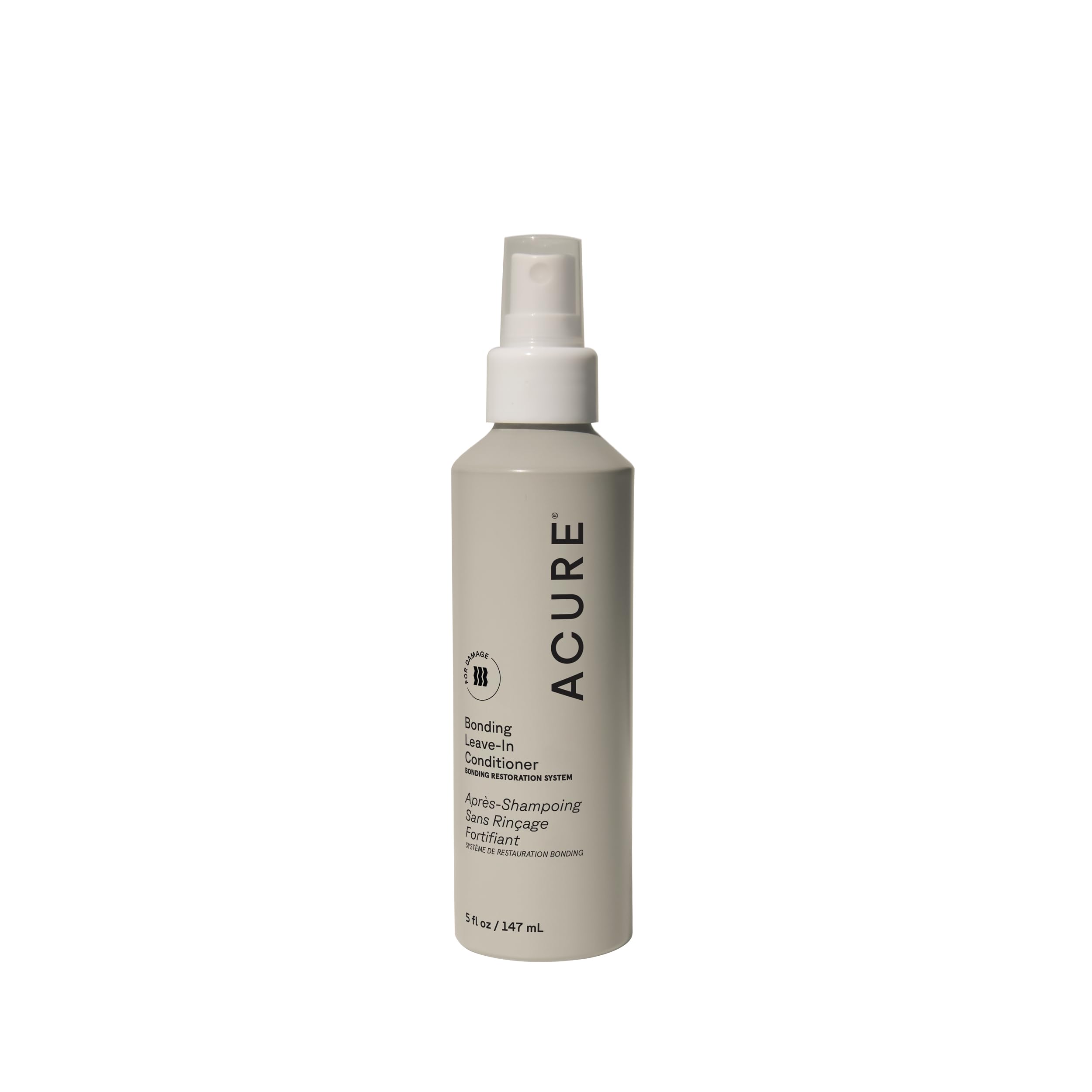 Acure Bonding Leave-In Conditioner bottle pour illustrating lightweight hydration and protection.