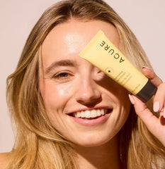 Acure Brightening Night Cream embossed label closeup signals clean, cruelty-free formula