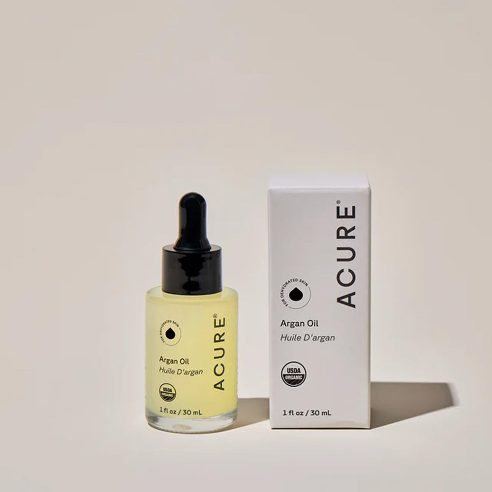 Acure The Essentials Argan Oil used as body moisturizer on dry skin.