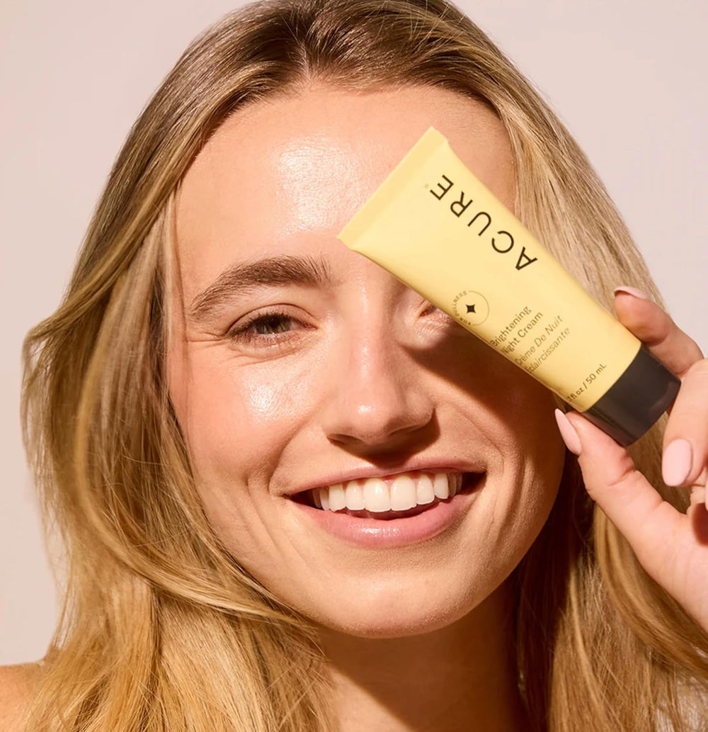 Acure Brightening Night Cream texture close-up shows velvet overnight hydration
