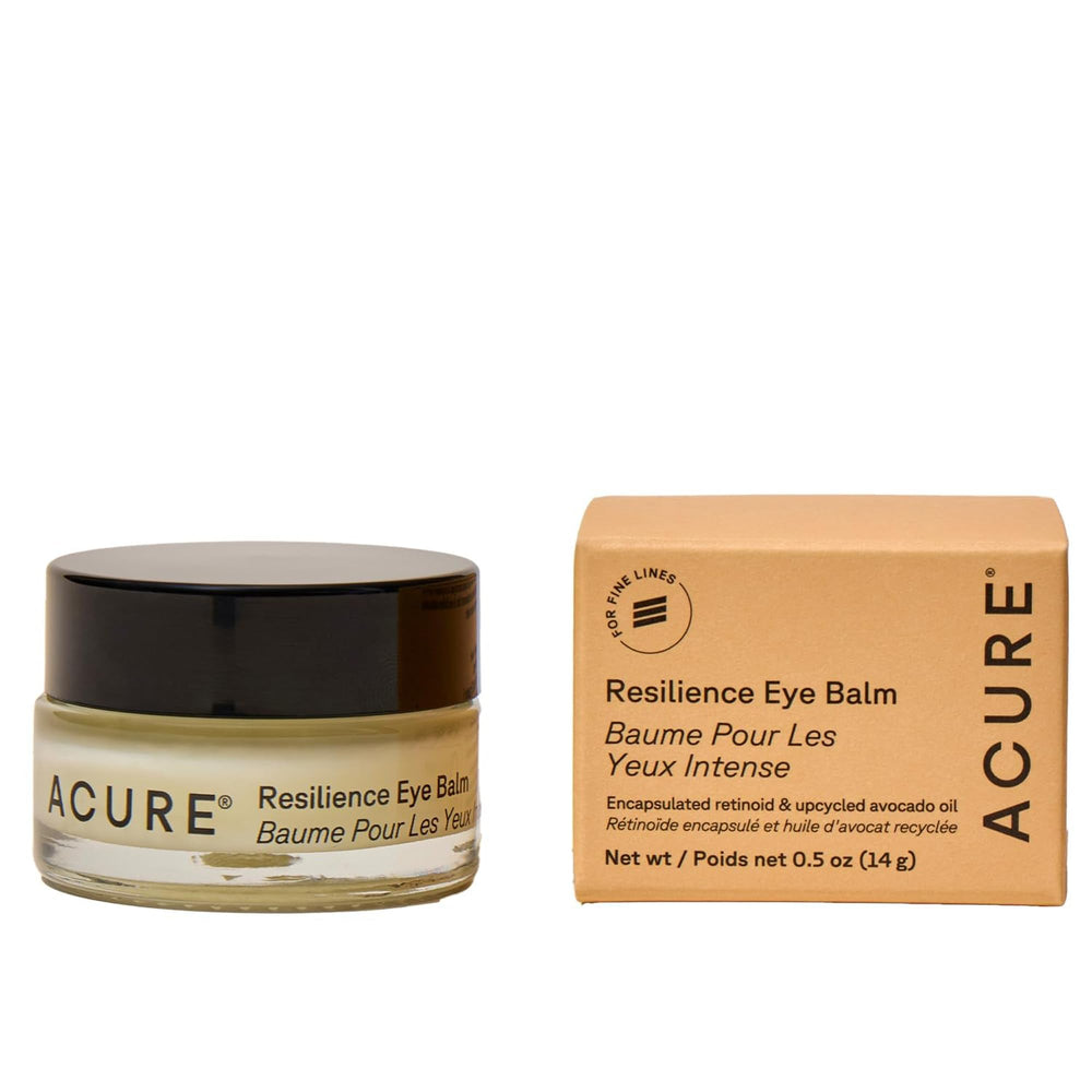 Acure Resilience Eye Balm jar closeup shows creamy texture for gentle application.