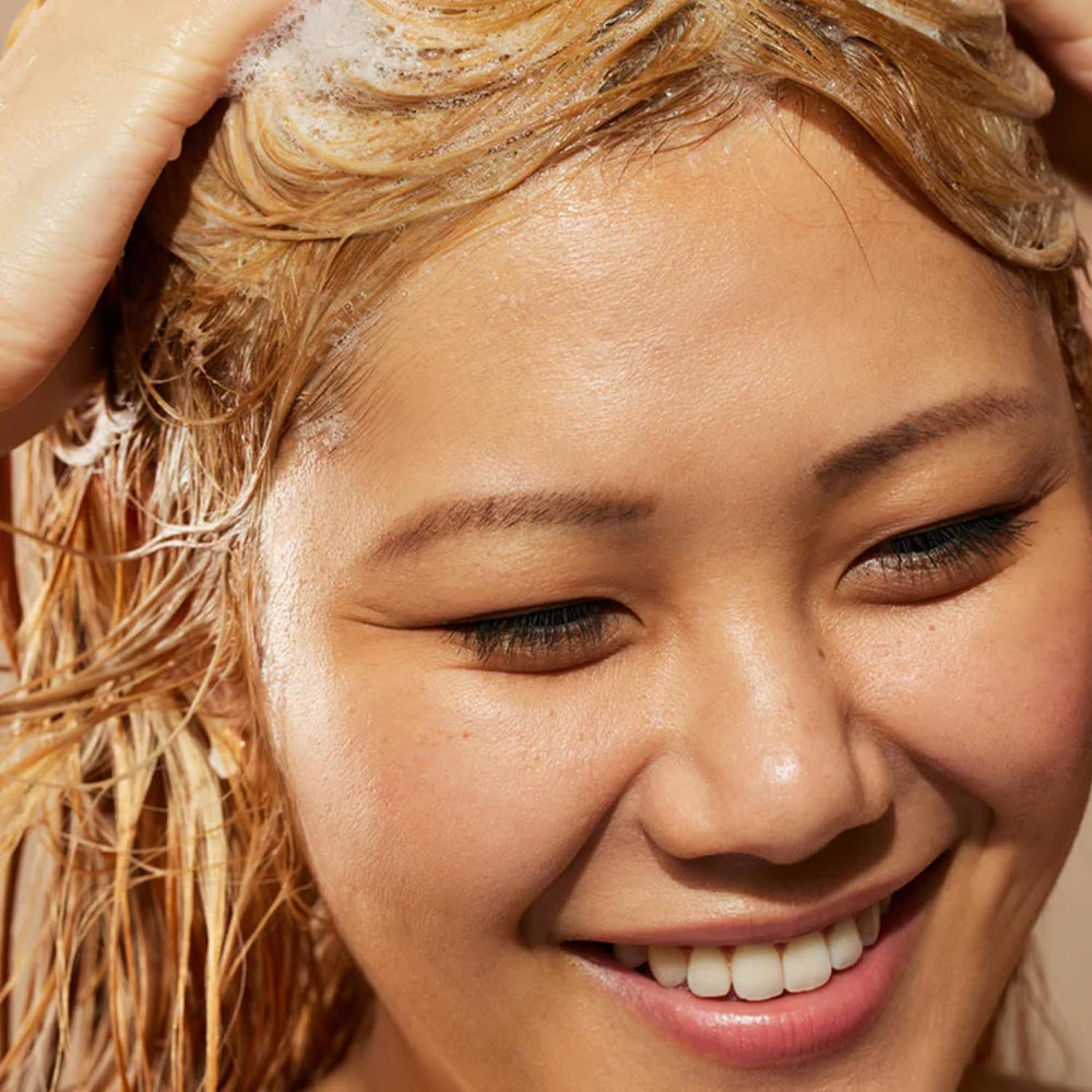 Acure Simply Smoothing Shampoo for daily use on all hair types.