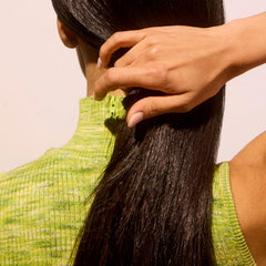 Acure Vivacious Volume hair closeup reveals shine and bouncy texture