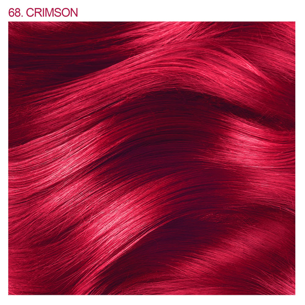 Adore Crimson color application on hair demonstrates smooth, even at home coverage.