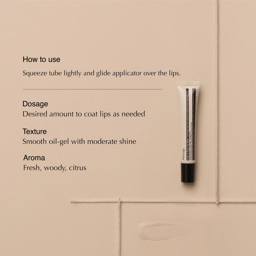 Aesop Cedar & Citrus Lip Balm application scene highlighting easy squeeze-tube precision.