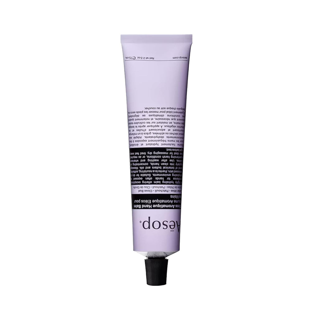 Aesop Eleos travel balm tube close-up offers quick moisture relief