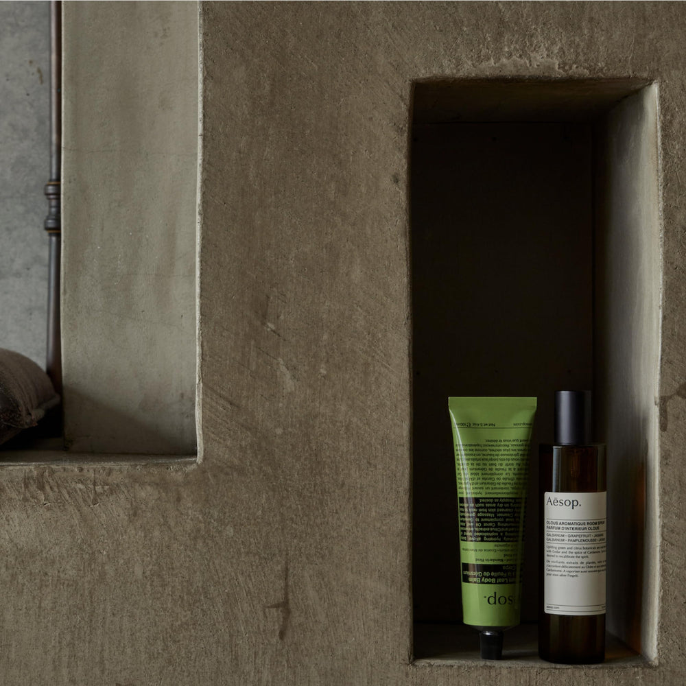 Green citrus aroma of Aesop Geranium Leaf Exfoliating Body Scrub.