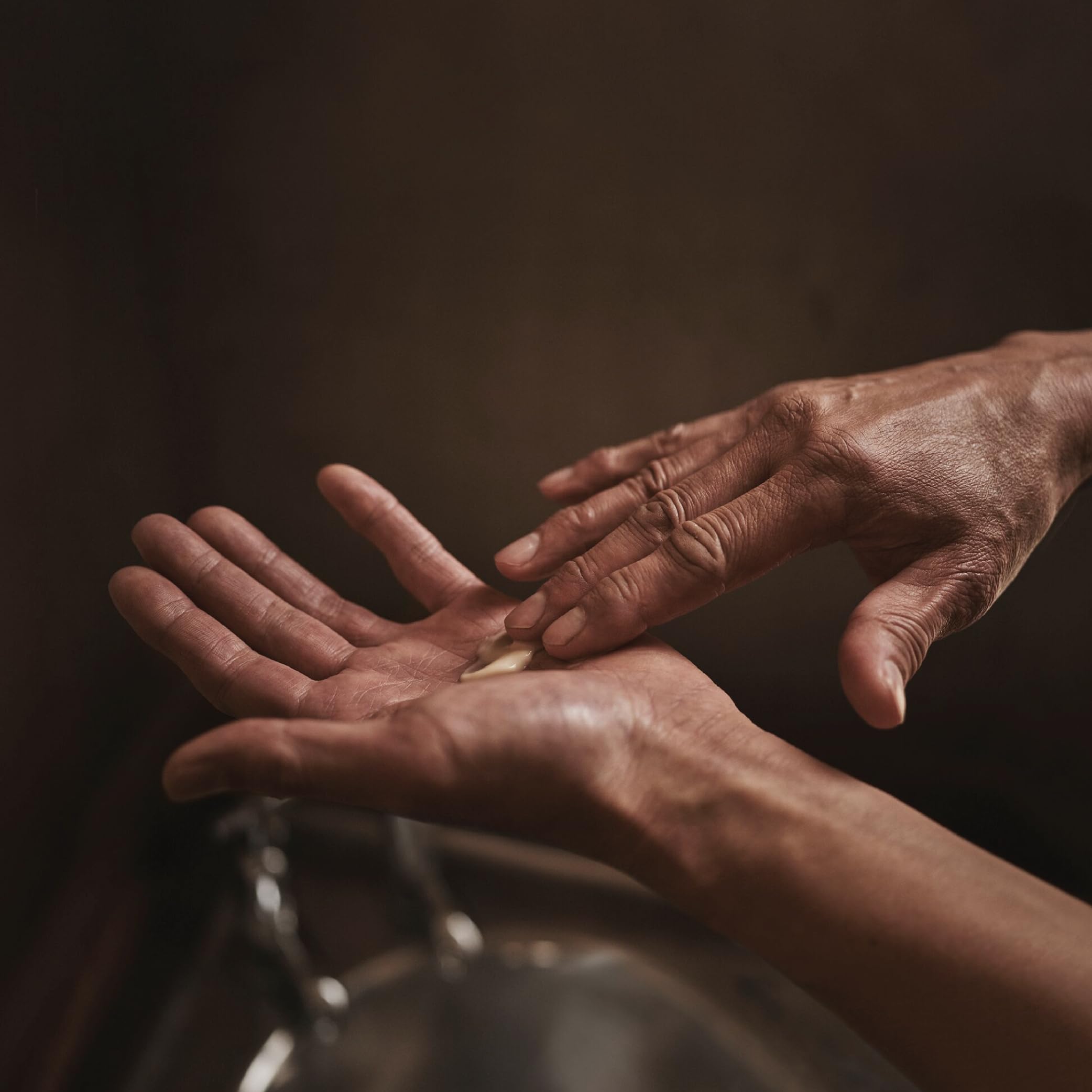 Aesop Rejuvenate Balm texture swirl, creamy and luxurious for dry skin.