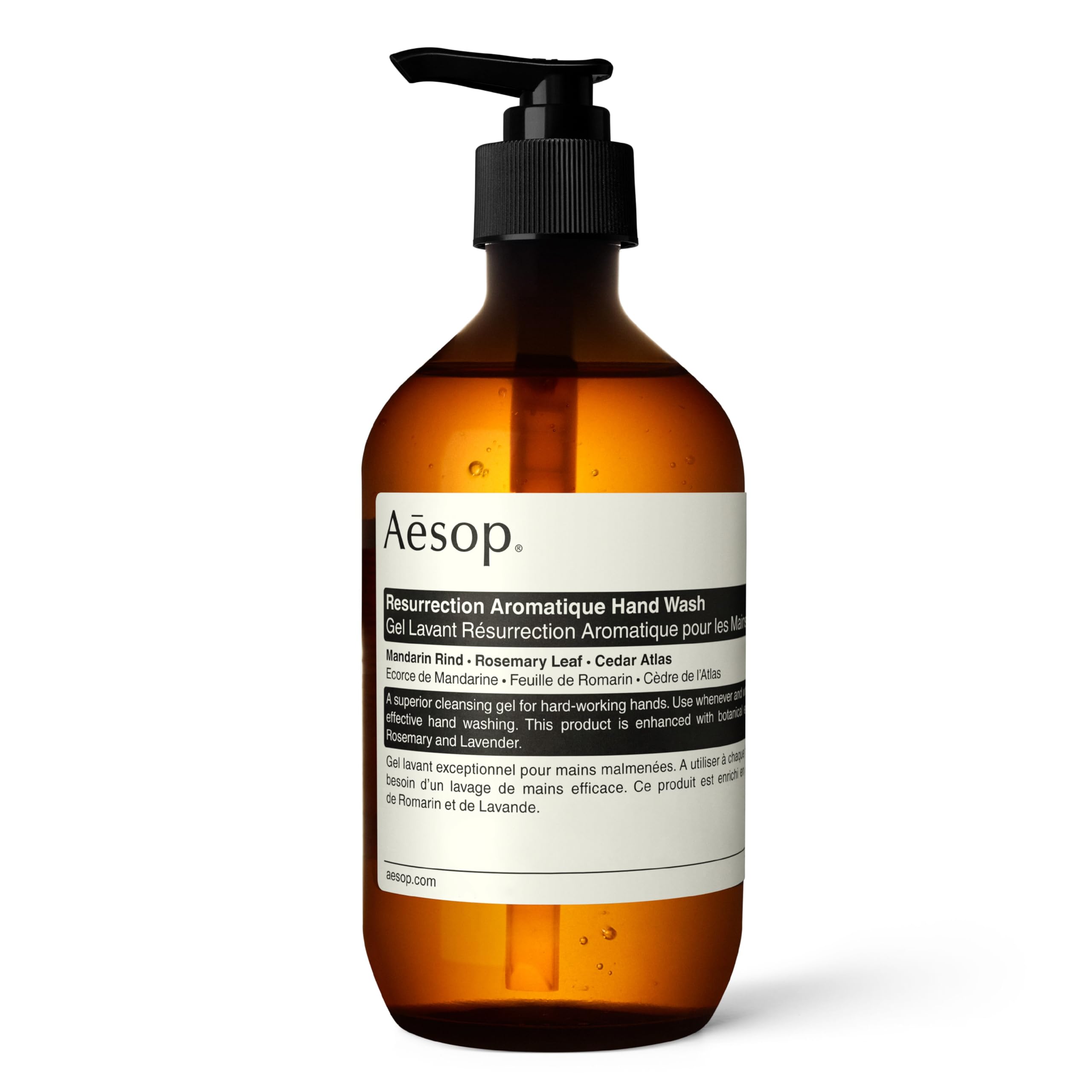 Aesop Resurrection Aromatique Hand Wash bottle on a sink offering gentle cleansing.