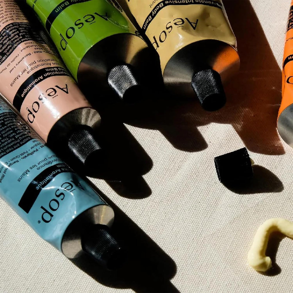 Aesop Reverence hand balm near cuticles offers gentle hydration.