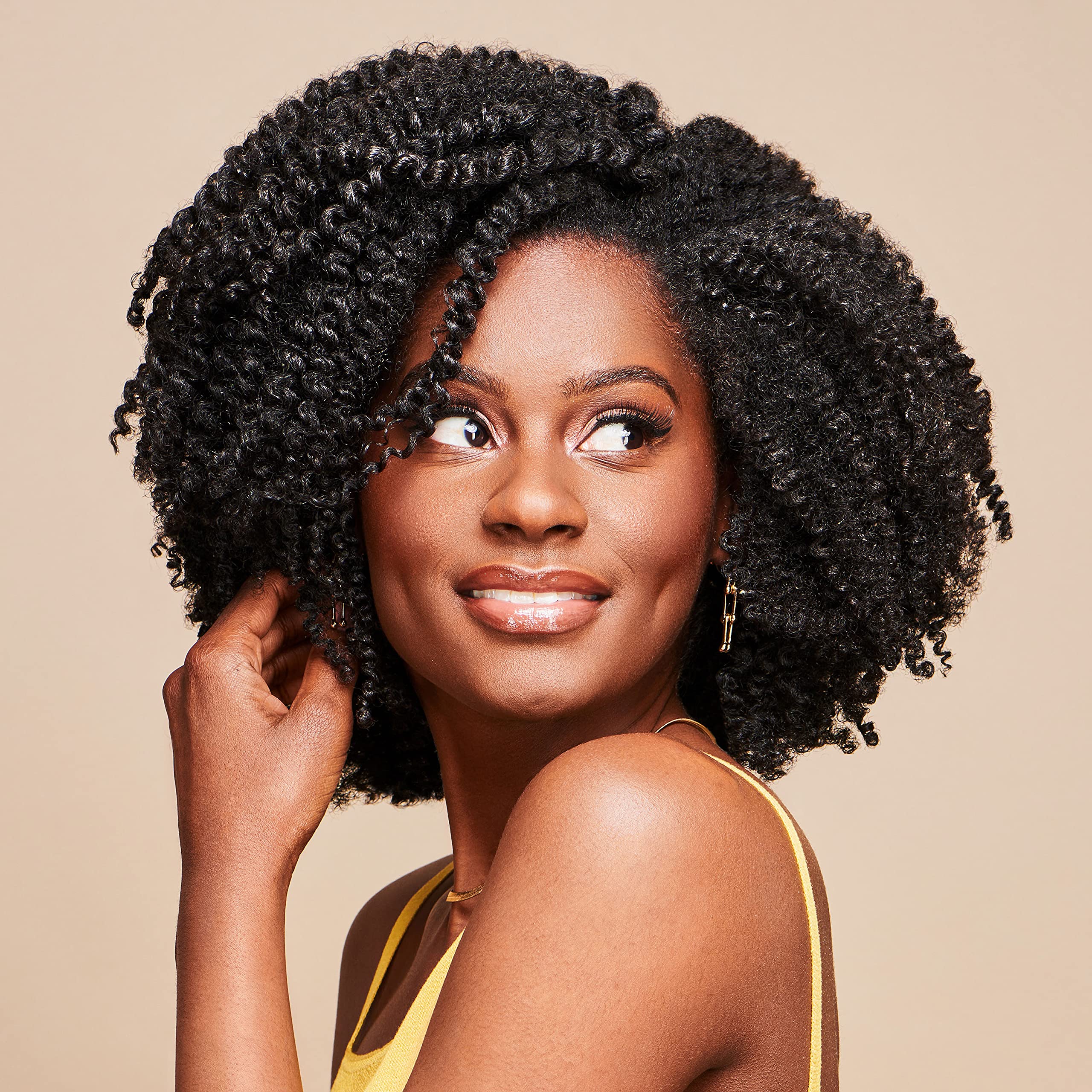 African Pride Moisture Miracle Curling Cream braid-outs deliver defined, moisturized coils