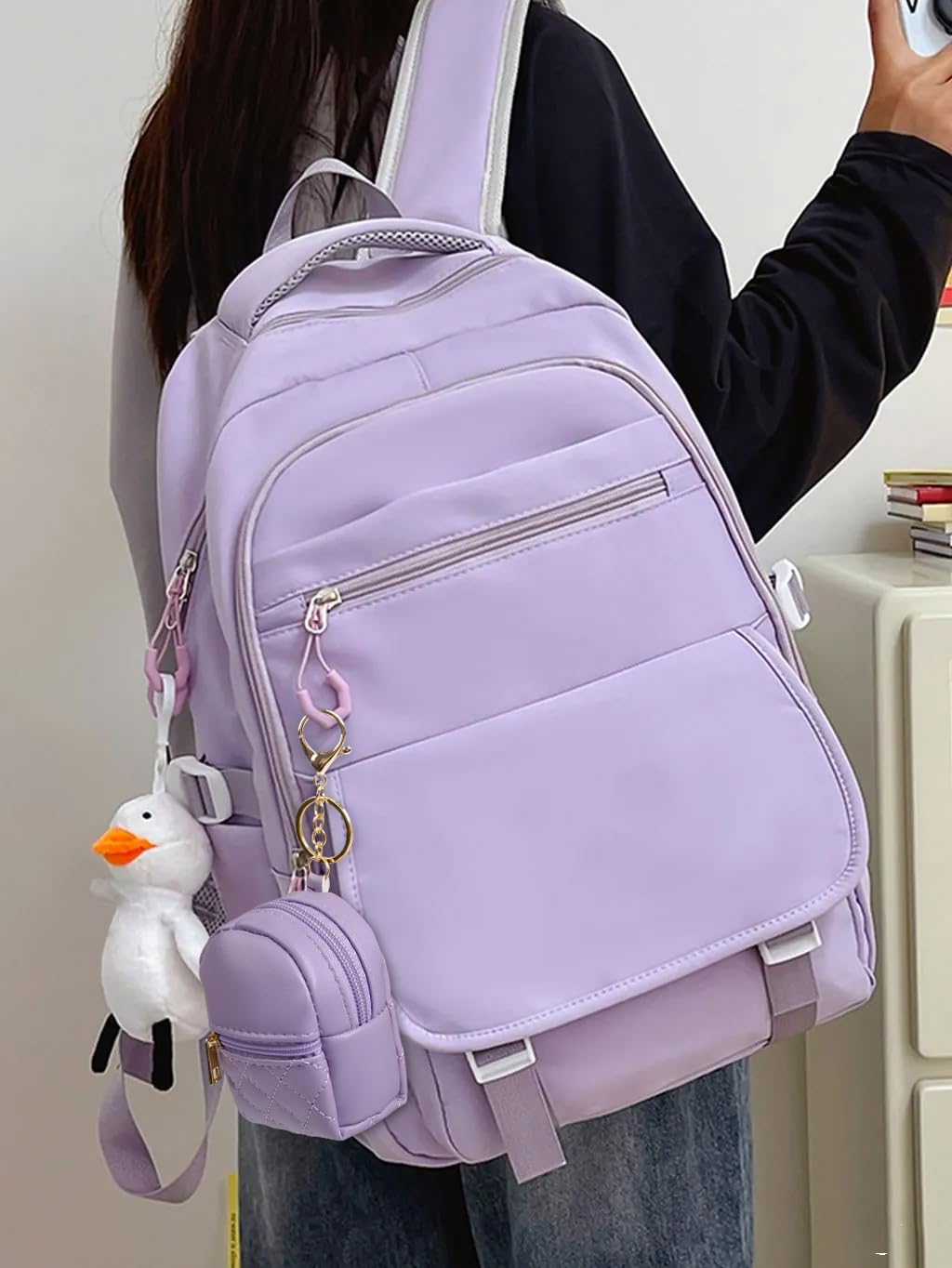 AIBFRID beige mini backpack keychain provides stylish organization on the go.