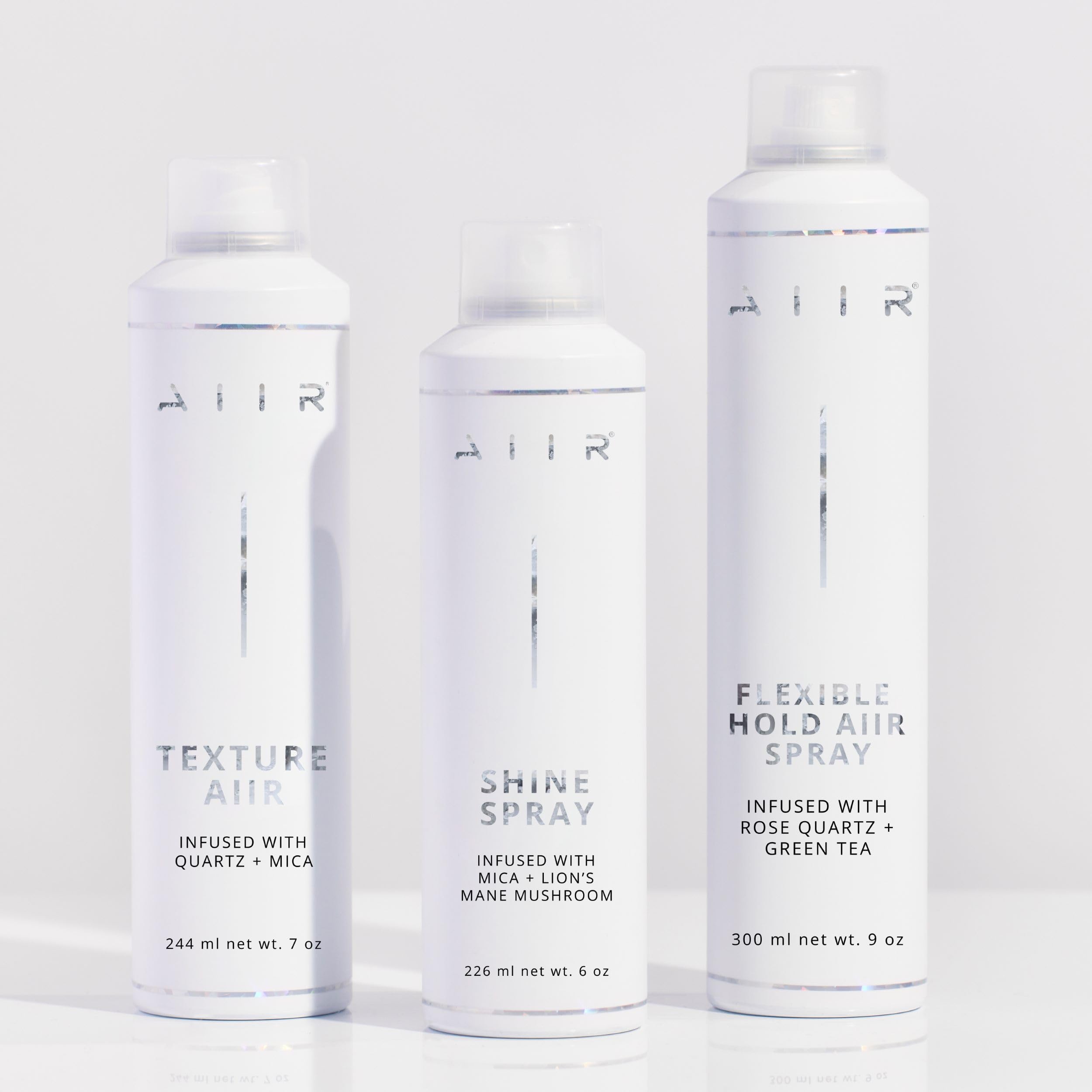 AIIR Flexible Hold Hairspray demonstrates humidity resistance and frizz control in damp weather.