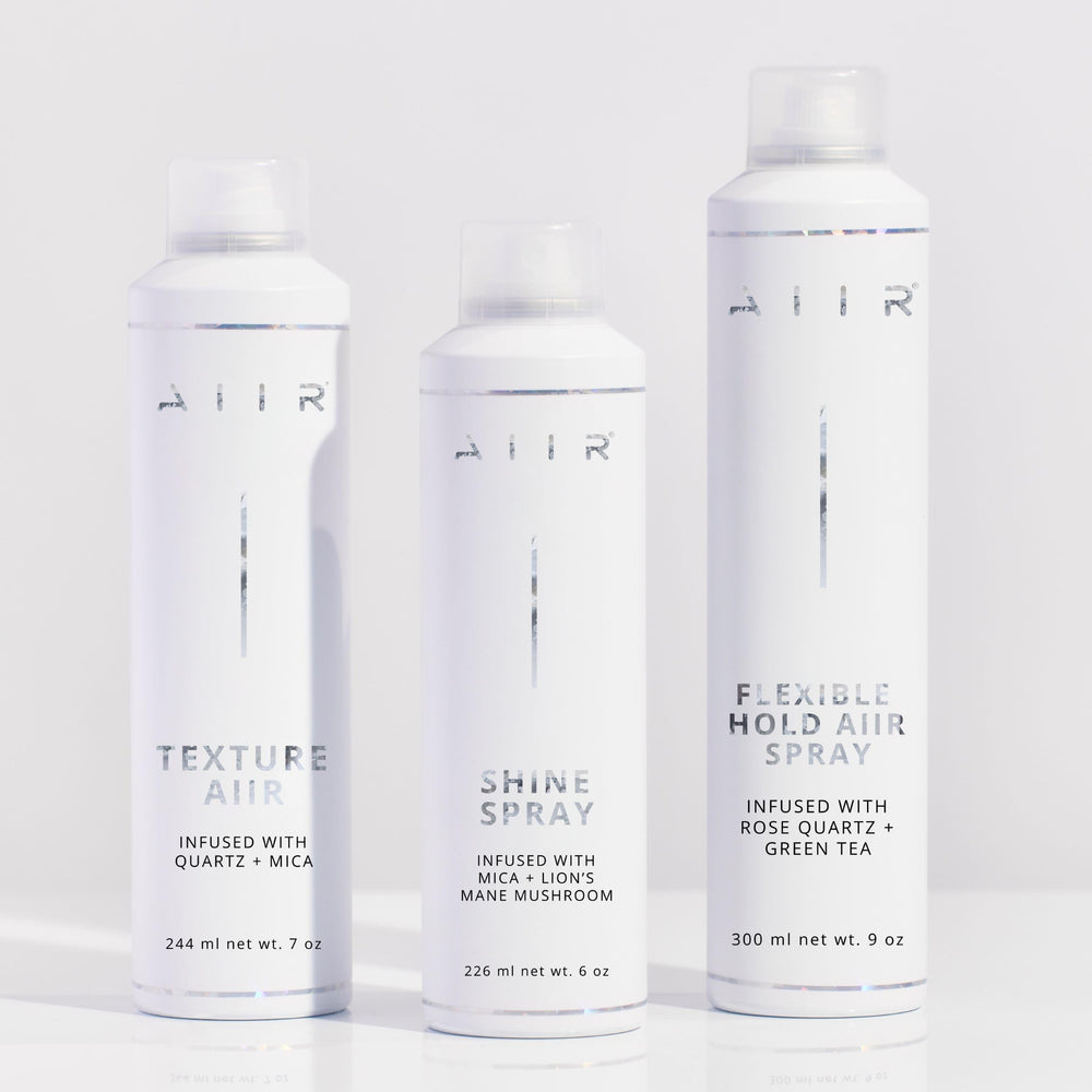 AIIR Flexible Hold Hairspray demonstrates humidity resistance and frizz control in damp weather.