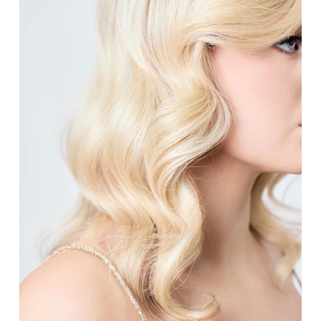 AIIR Shine Spray flyaway-taming reduces stray hairs for a polished look.
