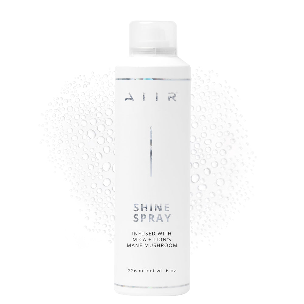 AIIR Shine Spray glossy-finish delivers luminous shine and frizz control for sleek styles.