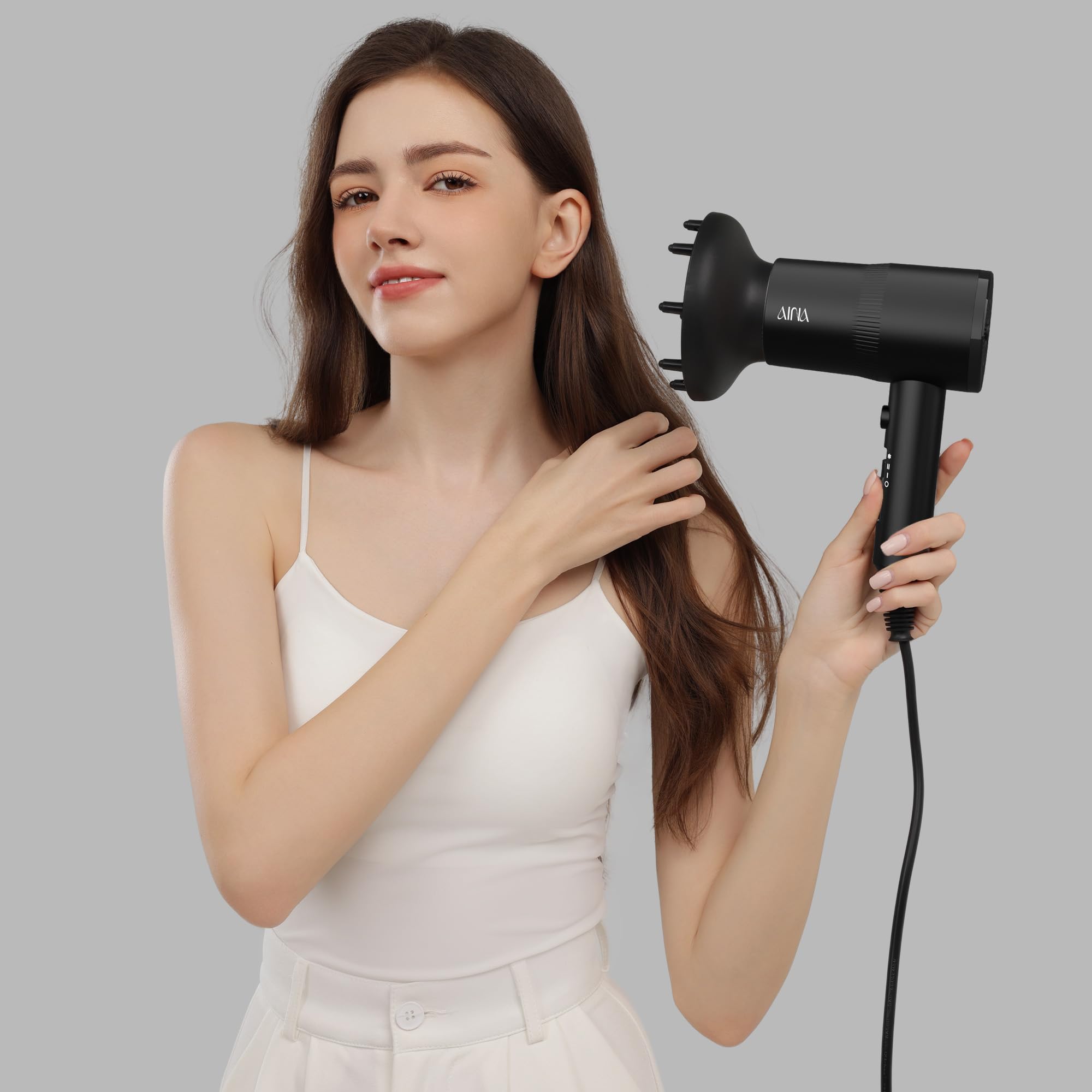 AINA hair dryer cold-shot button for locking in style