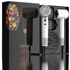 Aina hair dryer front view in ivory white for travel-friendly styling.