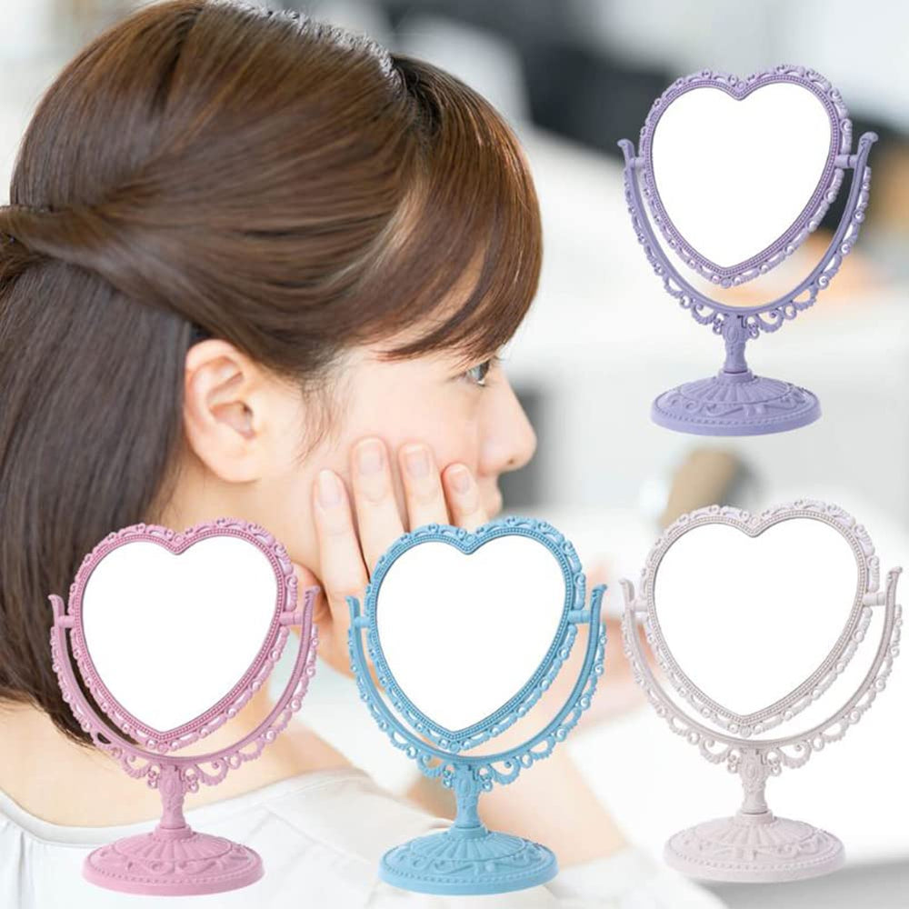 AKOAK double-sided heart mirror provides magnification for detail checks.