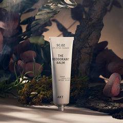 Texture close-up of AKT Deodorant Balm cream for moisturizing care.