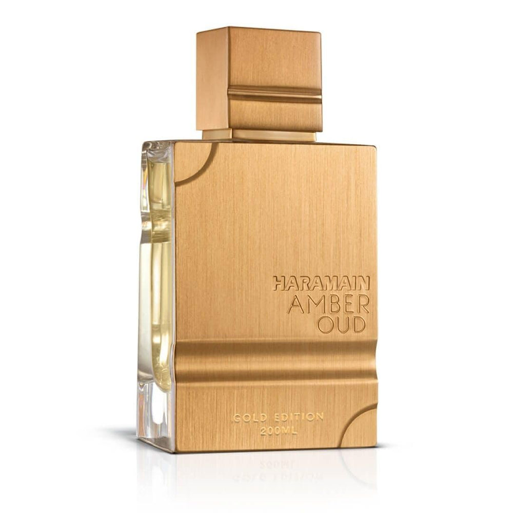 Al Haramain Amber Oud Gold Edition box opens to reveal elegant packaging.